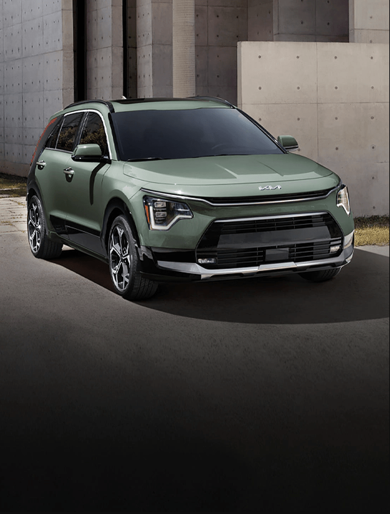 A dark green color new Kia Niro electric SUV