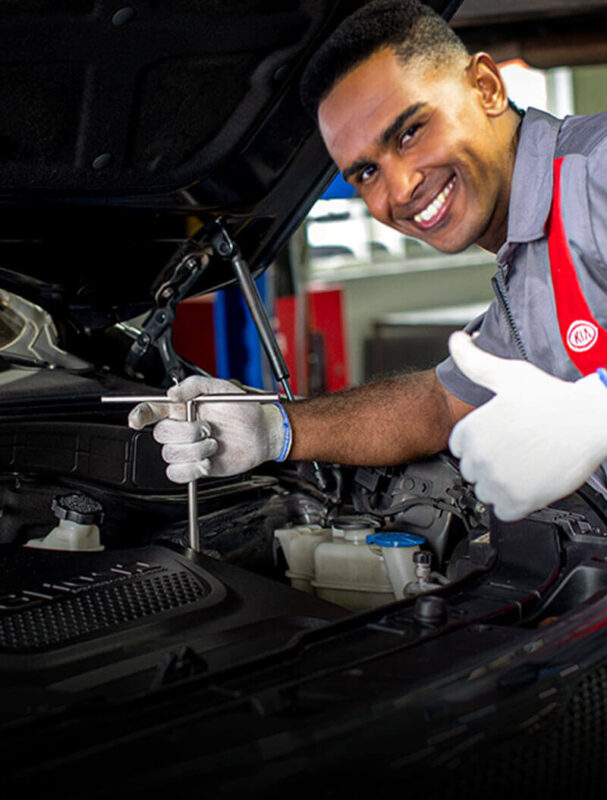 A motor mechanic working in the Kia service station