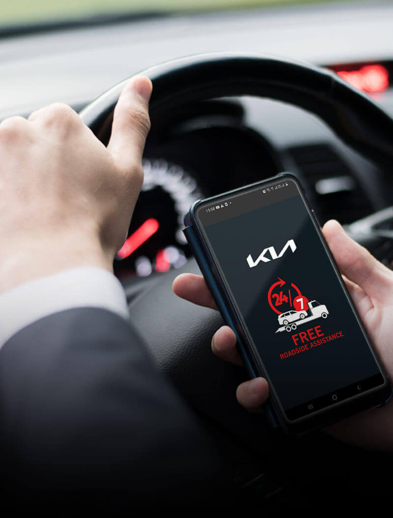 Kia Roadside assistance app opened in a mobile of a driver