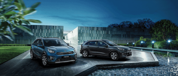 Kia Niro Hybrid next to a Garden