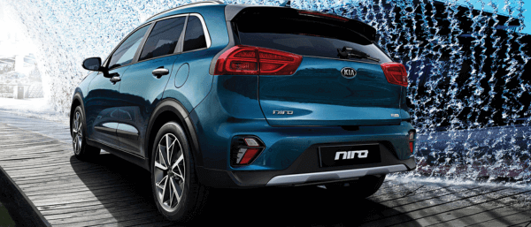 Kia Niro Next to a Waterfall