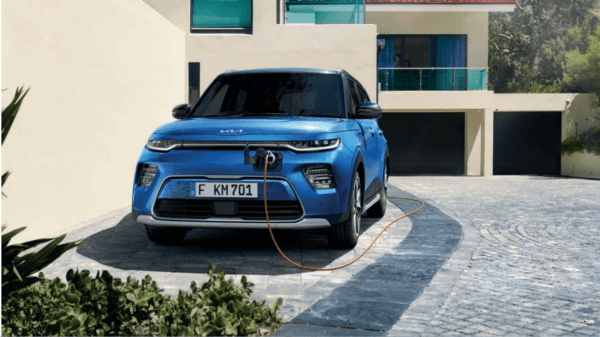 A blue color Kia Soul Electric Car charging